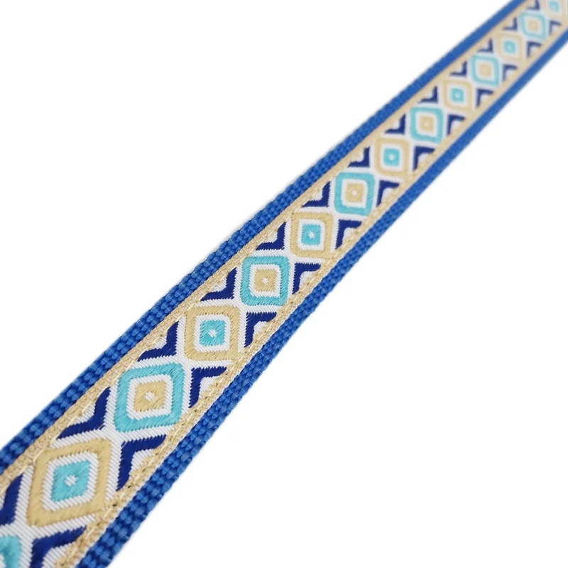 Jacquard webbing material sample showing branded pattern weaving